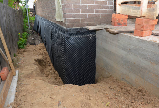 Happy homeowners after waterproofing job in Lansdowne
